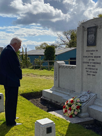 Provost Martin Brennan laying a wreath for the 80th anniversary of the Greenock Blitz